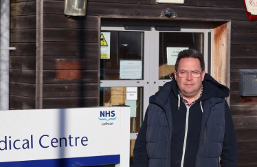 Craig outside Gullane Medical Centre